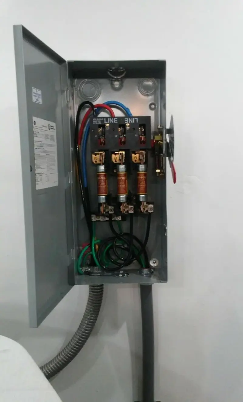 Three-phase disconnect switch installed for Smoke Detector Installation in Emma